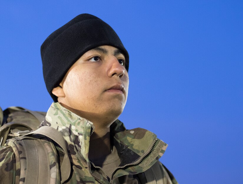 United States Army Pfc. Alberto Garcia, assigned to 20th Engineer Brigade, stands at attention after a 6-mile ruck march during day two of Air Assault School’s Class 301-19 on Feb. 7, 2019, at Camp Buehring, Kuwait. Developing a prepared and capable leader is one of the U.S. Army’s modernization efforts.