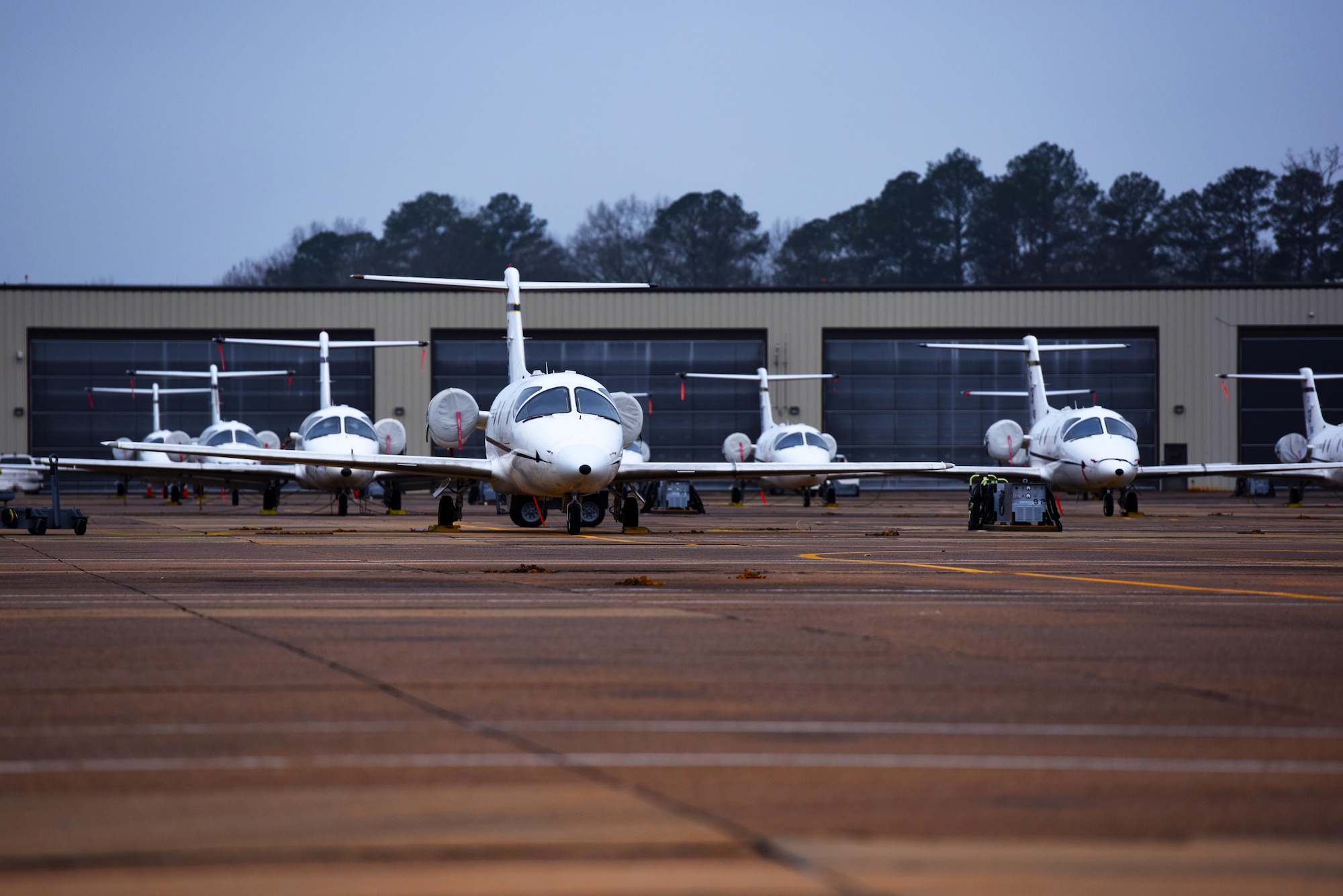 The 48th Flying Training Squadron’s fleet of T-1A Jayhawks sit on the flight line at Columbus Air Force Base, Mississippi, Feb. 5, 2019. The T-1 is used in Specialized Undergraduate Pilot Training for the students who are selected to fly airlift or tanker aircraft. (U.S. Air Force photo by Senior Airman Beaux Hebert)
