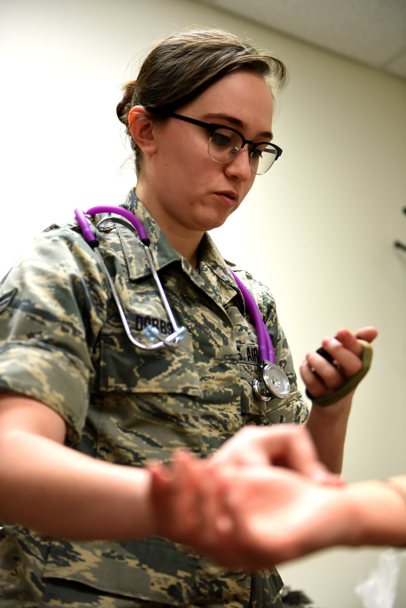 U.S. Air Force Senior Airman Kathryn Dobbs, an aerospace medical technician assigned to the 180th Fighter Wing, Ohio Air National Guard, checks an Airman’s heart rate during an incentive flight physical at Patrick Air Force Base, Florida, Feb. 1, 2019. The 180th FW deployed more than 130 Airmen and 10 F-16s to Patrick in an effort to enhance flying operations and readiness capabilities often hindered by harsh winter weather at home-station in Northwest Ohio. Incentive flights are special flights provided to outstanding Airmen who continually go above and beyond in their primary duties. (Air National Guard photo by Senior Master Sgt. Beth Holliker)