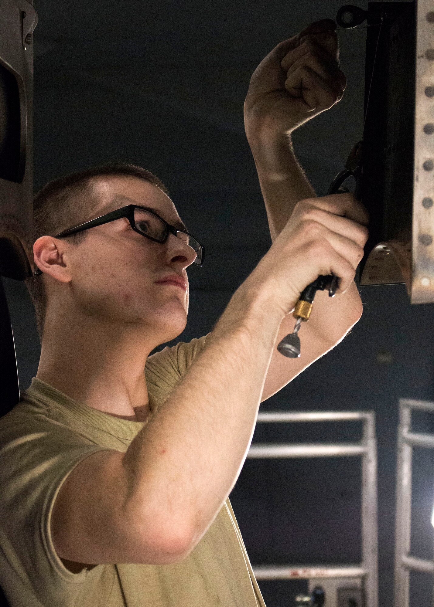 Airman 1st Class Connor Karman, an aerospace propulsion technician with the 445th Maintenance Squadron, performs routine maintenance on the wing of a C-17 Globemaster III. (U.S. Air Force photo/Senior Airman Ethan Spickler)