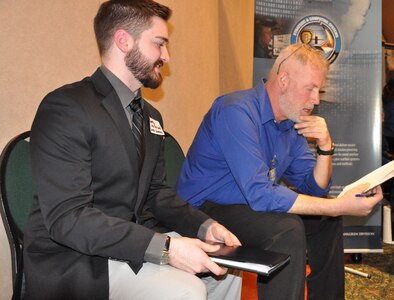 IMAGE: FREDERICKSBURG, Va. (Feb. 5, 2019) - A Naval Surface Warfare Center Dahlgren Division (NSWCDD) representative discusses career opportunities with a candidate at the NSWCDD Career Fair. The command made 36 on-the-spot job offers at the event held in the Fredericksburg Expo and Conference Center. "This is the first year that we opened the event up to non-science and engineering positions and we had an overwhelming response for our contract, financial, and information technology positions," said Shelby Khan, the NSWCDD Human Resources Recruiting Program lead. "We anticipate additional interviews and offers resulting from the career fair in the weeks to come."