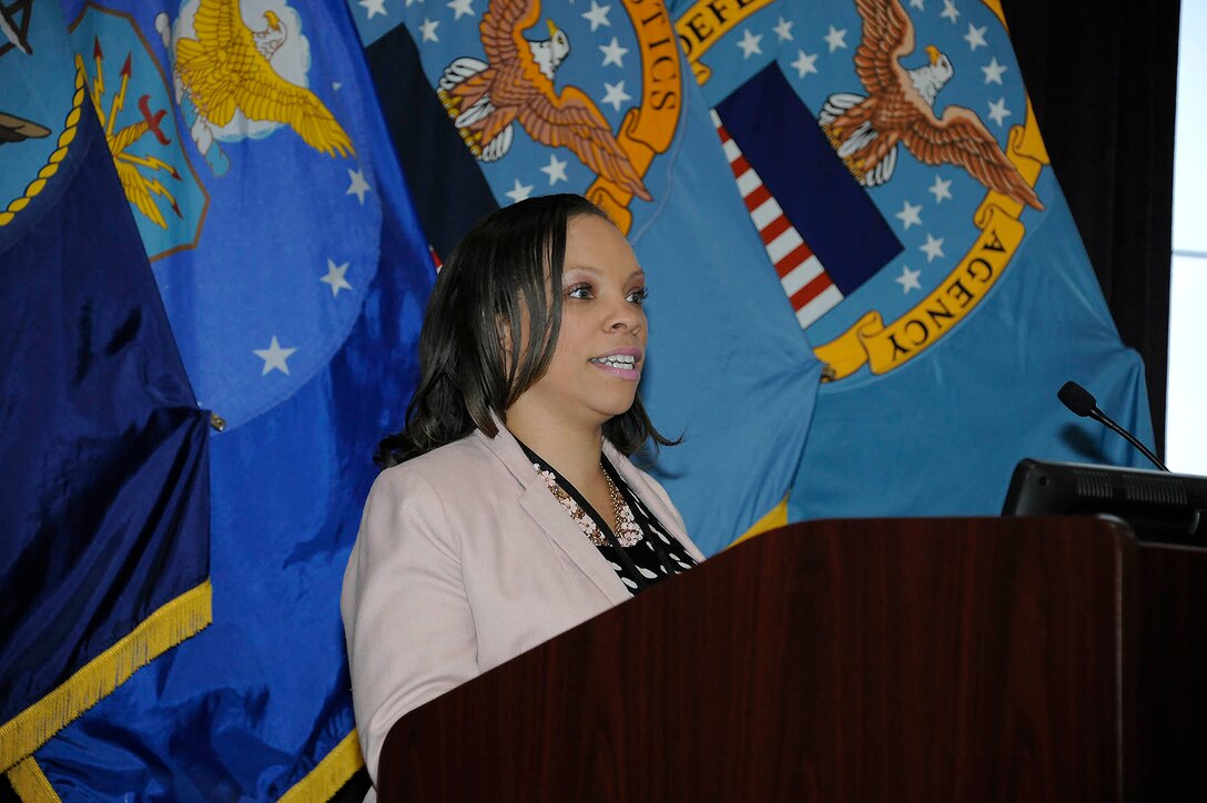 Lakeea Kelly, manager of the Dr. Martin Luther King Jr. Commemoration Event for the Equal Employment Opportunity Office, offers closing remarks.