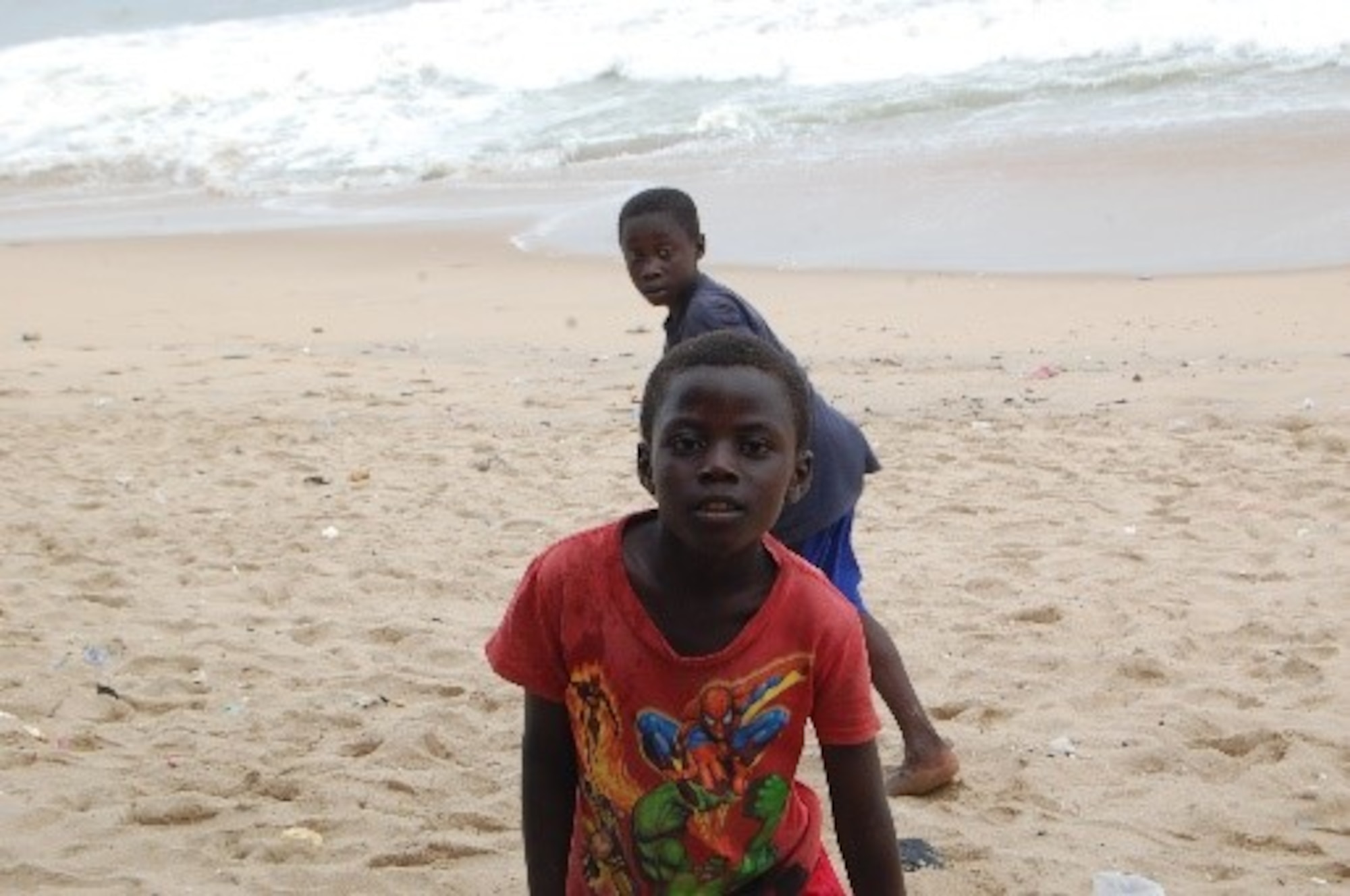 Ghanaian orphan boys playing on a beach. (Courtesy photo/Breanna McGowan)