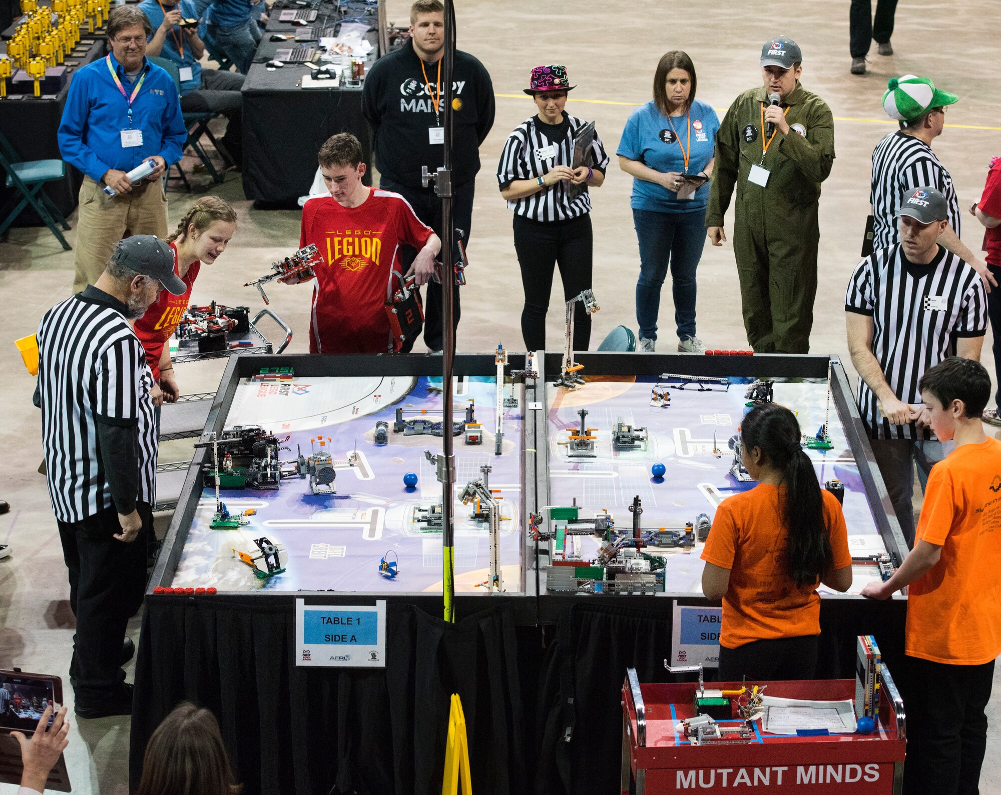 Two teams put their robots through their paces in the second round of the FIRST LEGO League Ohio championship tournament Feb. 3 in Wright State University’s Ervin J. Nutter Center.