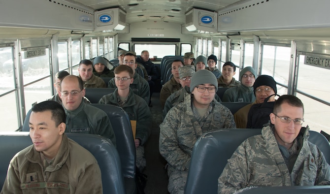 Airmen from the 557th Weather Wing (WW) departing for the Individual Protection Equipment office at Offutt Air Force Base, Nebraska, to receive mobility bags as part of Exercise Winter Havoc Jan. 29, 2019. The 557th WW participated in its first mass readiness exercise with the 55th Wing since the weather wing’s creation in 2015. (U.S. Air Force photo by Paul Shirk)