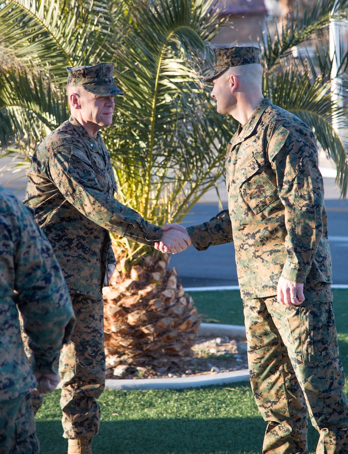 Brigadier General Jospeh Shrader, Commanding General, Marine Corps Logistics Command, is greeted by Colonel Craig Clemans, Commander, Marine Corps Logistics Base Barstow, prior to the general's scheduled Town Hall meeting with Production Plant Barstow personnel, Feb. 6.