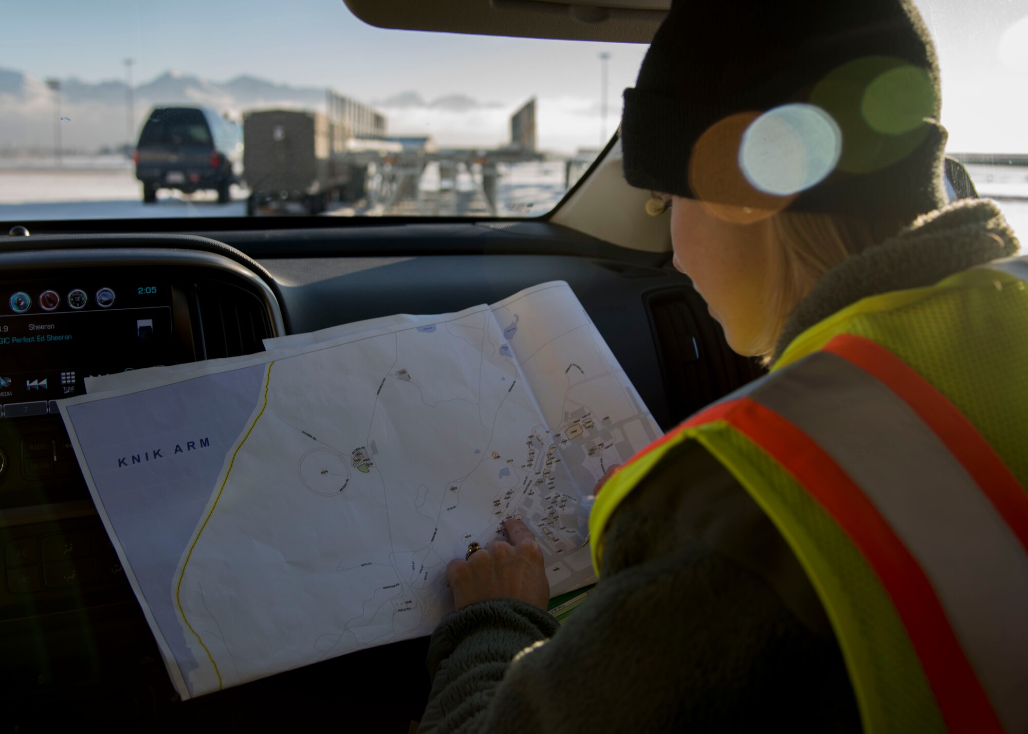 U.S. Air Force Staff Sgt. Courtney Kohnke, 673d Civil Engineer Squadron construction inspector, looks at a map of facilities at Joint Base Elmendorf-Richardson, Alaska, Jan. 31, 2019. Since the Nov. 30, 2018 earthquake more than 20 CES Airmen have been trained in the ATC-20-1 Post-earthquake Safety Evaluation of Buildings to maintain and improve agile support capabilities. A level-four category is for facilities used seasonally or infrequently.