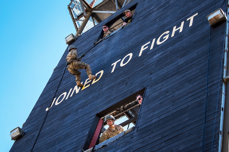 An Airman rappels down the Safeside Rappel Tower during an Army Air Assault Assessment (AAA), Jan. 28, 2019, at Moody Air Force Base, Ga. The AAA is designed to determine Airmen’s physical and mental readiness before being able to attend Army Air Assault school. (U.S. Air Force photo by Airman First Class Eugene Oliver)