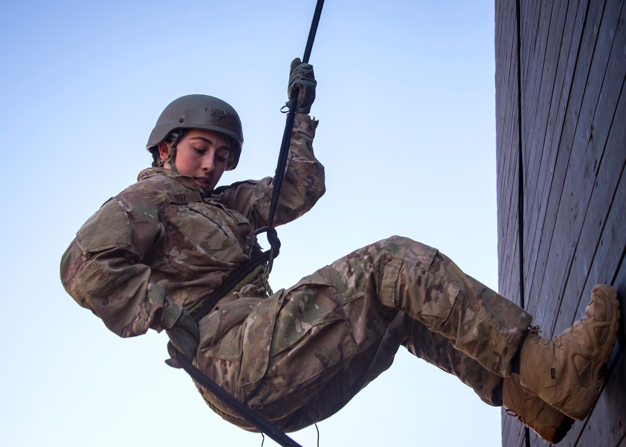 Airman First Class Madison Ruiz, 823 Base Defense Squadron security forces member, prepares to rappel down the Safeside Rappel Tower during an Army Air Assault Assessment (AAA), Jan. 28, 2019, at Moody Air Force Base, Ga. The AAA is designed to determine Airmen’s physical and mental readiness before being able to attend Army Air Assault school. (U.S. Air Force photo by Airman First Class Eugene Oliver)