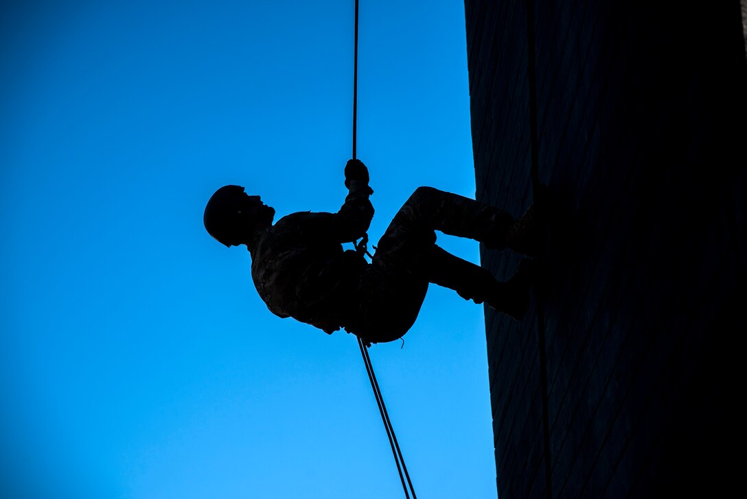 An Airman prepares to rappel down the Safeside Rappel Tower during an Army Air Assault Assessment (AAA), Jan. 28, 2019, at Moody Air Force Base, Ga. The AAA is designed to determine Airmen’s physical and mental readiness before being able to attend Army Air Assault school. (U.S. Air Force photo by Airman First Class Eugene Oliver)