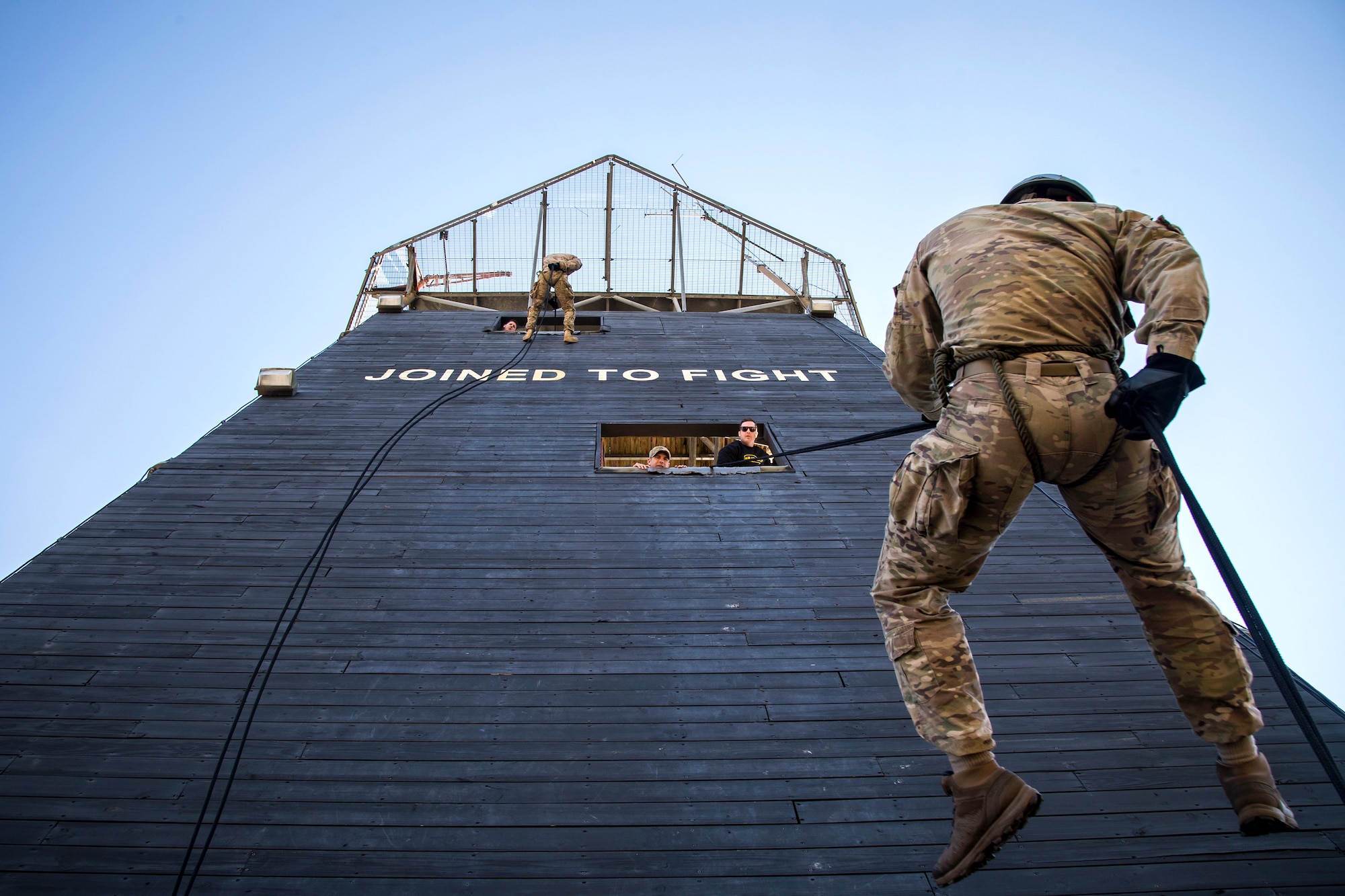 Airmen rappel down the Safeside Rappel tower during an Army Air Assault Assessment (AAA), Jan. 28, 2019, at Moody Air Force Base, Ga. The AAA is designed to determine Airmen’s physical and mental readiness before being able to attend Army Air Assault school. (U.S. Air Force photo by Airman First Class Eugene Oliver)