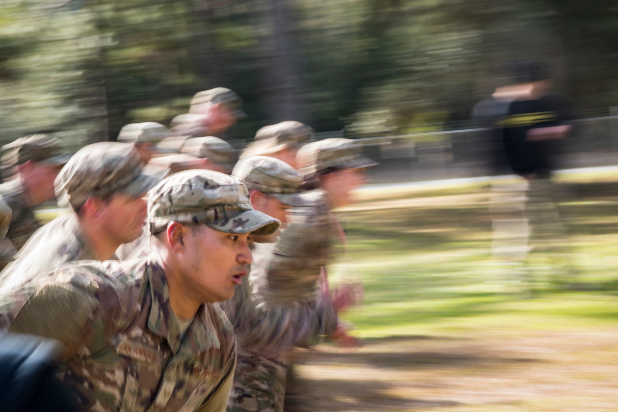 Airmen sprint during an Army Air Assault Assessment, Jan. 30, 2019, at Camp Blanding, Fla. Throughout the assessment, airmen competed amongst themselves to demonstrate their overall readiness for Army Air Assault School. (U.S. Air Force photo by Airman First Class Eugene Oliver)