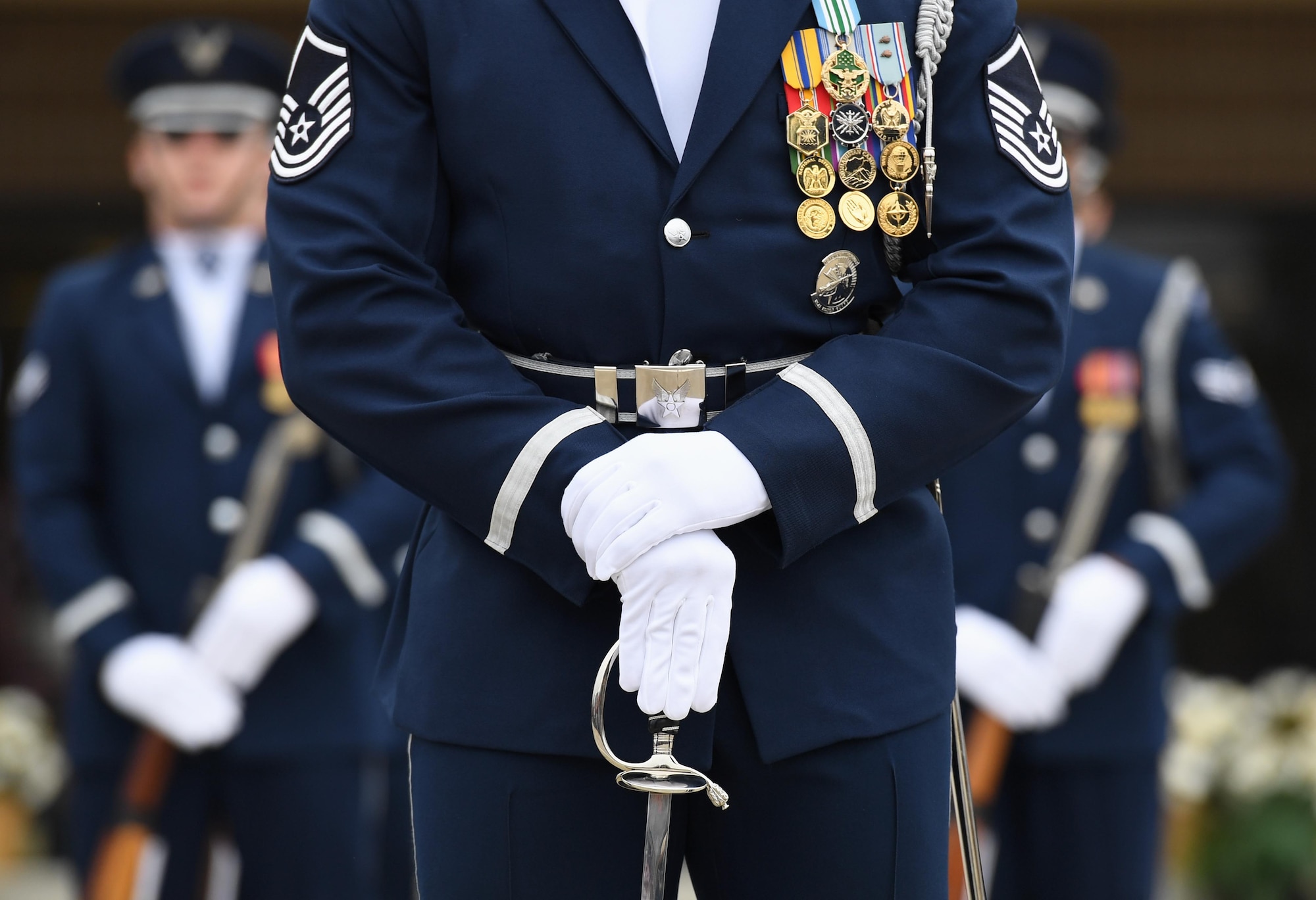 U.S. Air Force Master Sgt. Jason Prophet, U.S. Air Force Honor Guard Drill Team superintendent, participates in the debut performance of the team's 2019 routine in front of Keesler leadership and 81st Training Group Airmen on the Levitow Training Support Facility drill pad at Keesler Air Force Base, Mississippi, Feb. 8, 2019. The team comes to Keesler every year for five weeks to develop a new routine that they will use throughout the year. (U.S. Air Force photo by Kemberly Groue)