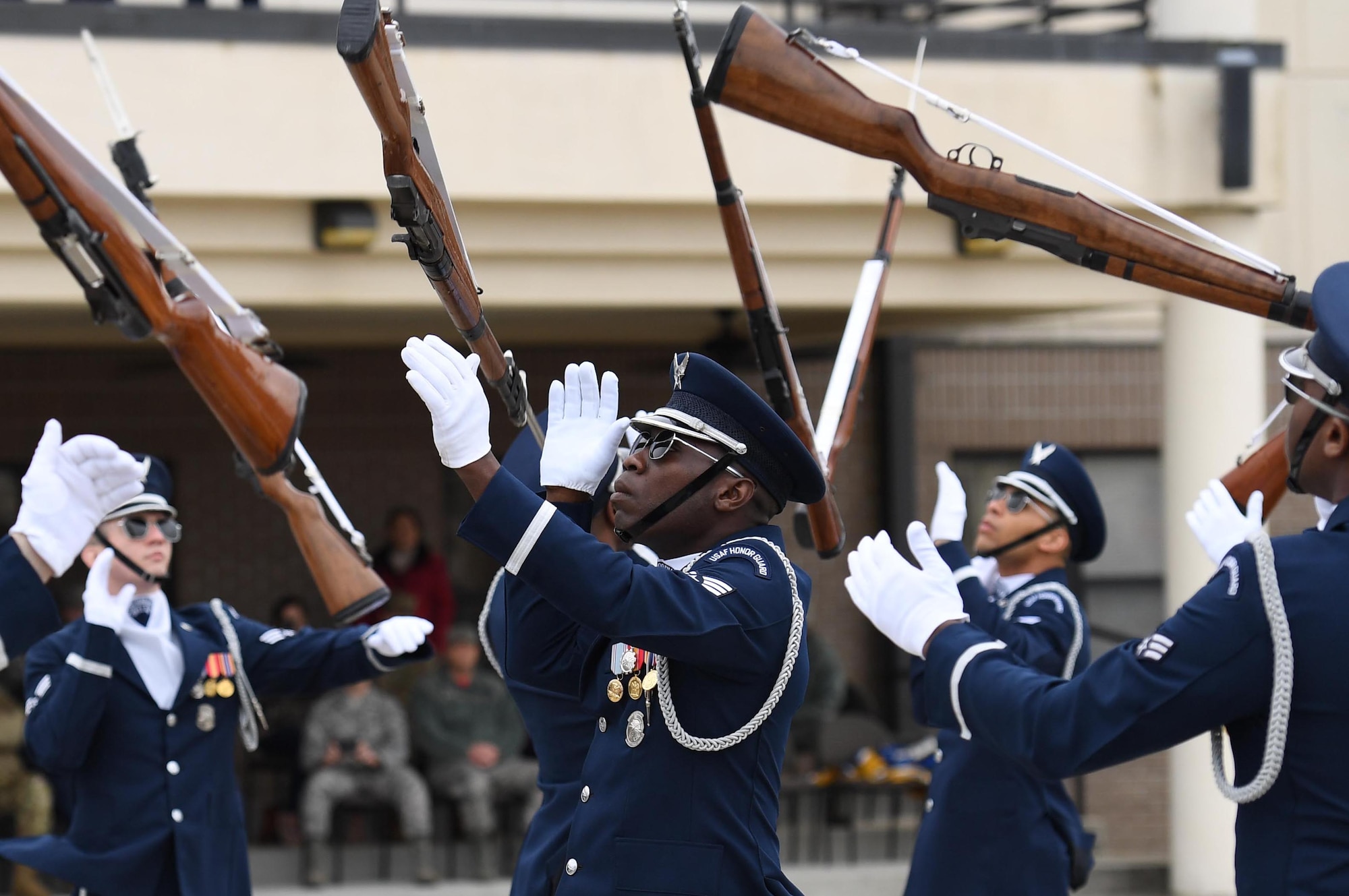 U.S. Air Force Senior Airman Colby Marshall, U.S. Air Force Honor Guard Drill Team member, participates in the debut performance of the team's 2019 routine in front of Keesler leadership and 81st Training Group Airmen on the Levitow Training Support Facility drill pad at Keesler Air Force Base, Mississippi, Feb. 8, 2019. The team comes to Keesler every year for five weeks to develop a new routine that they will use throughout the year. (U.S. Air Force photo by Kemberly Groue)