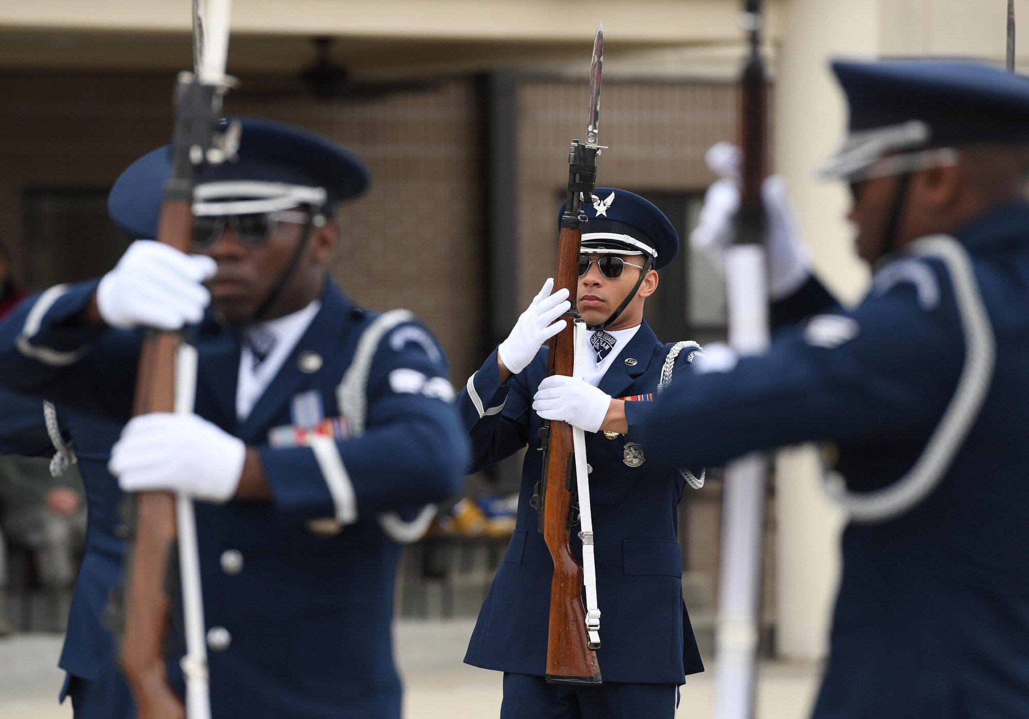 U.S. Air Force Senior Airman Bryan Satterlee, U.S. Air Force Honor Guard Drill Team member, participates in the debut performance of the team's 2019 routine in front of Keesler leadership and 81st Training Group Airmen on the Levitow Training Support Facility drill pad at Keesler Air Force Base, Mississippi, Feb. 8, 2019. The team comes to Keesler every year for five weeks to develop a new routine that they will use throughout the year. (U.S. Air Force photo by Kemberly Groue)