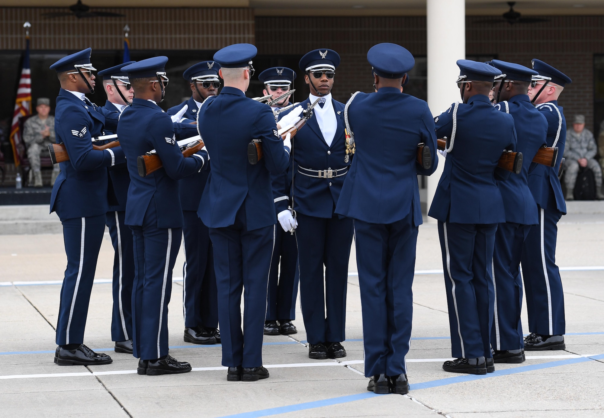 The U.S. Air Force Honor Guard Drill Team debuts their 2019 routine in front of Keesler leadership and 81st Training Group Airmen on the Levitow Training Support Facility drill pad at Keesler Air Force Base, Mississippi, Feb. 8, 2019. They are the nation's most elite honor guard, serving the President of the United States, the Air Force's most senior leaders and performing nationwide for the American public. The team comes to Keesler every year for five weeks to develop a new routine that they will use throughout the year. (U.S. Air Force photo by Kemberly Groue)