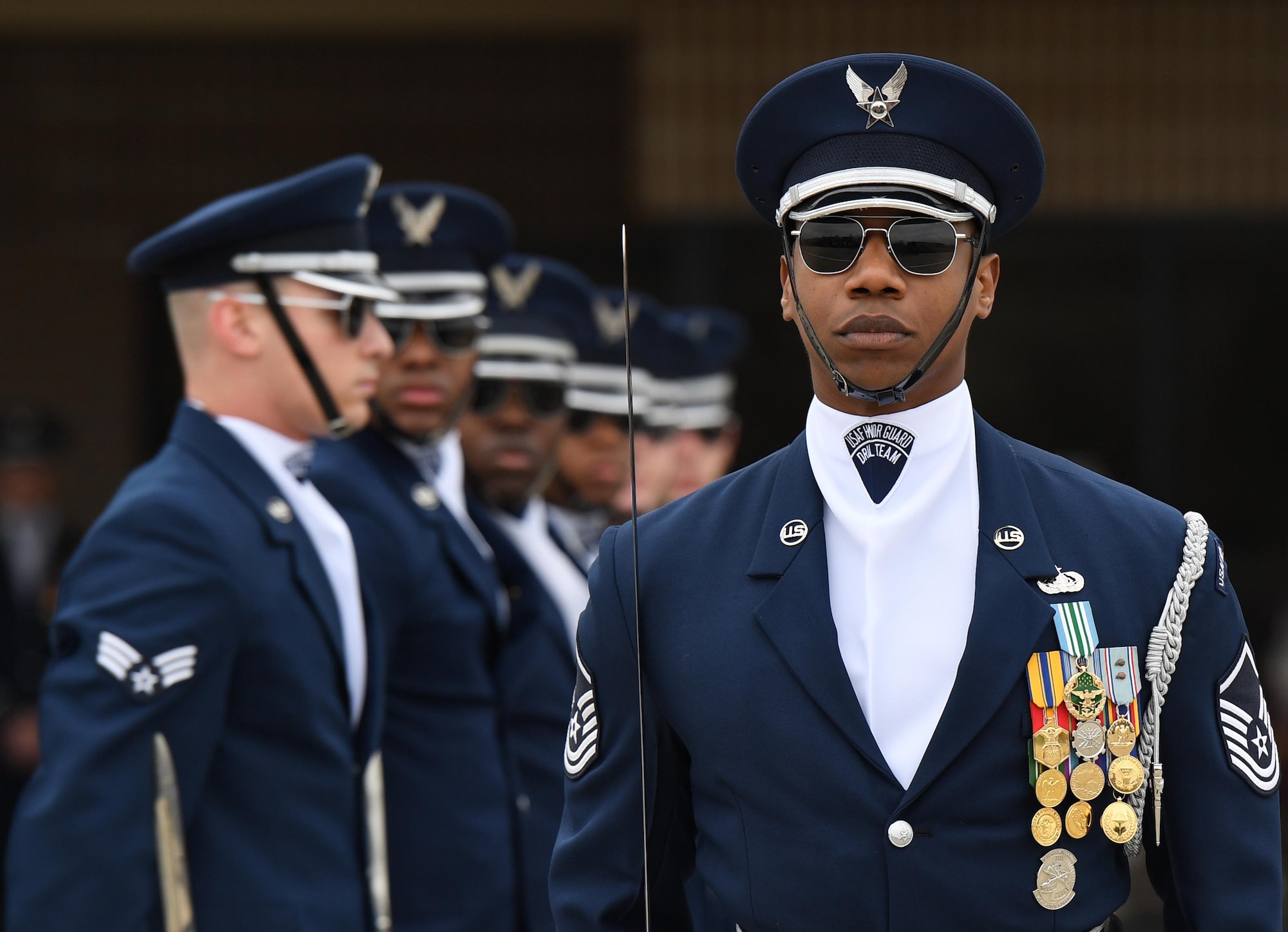 U.S. Air Force Master Sgt. Jason Prophet, U.S. Air Force Honor Guard Drill Team superintendent, participates in the debut performance of the team's 2019 routine in front of Keesler leadership and 81st Training Group Airmen on the Levitow Training Support Facility drill pad at Keesler Air Force Base, Mississippi, Feb. 8, 2019. The team comes to Keesler every year for five weeks to develop a new routine that they will use throughout the year. (U.S. Air Force photo by Kemberly Groue)