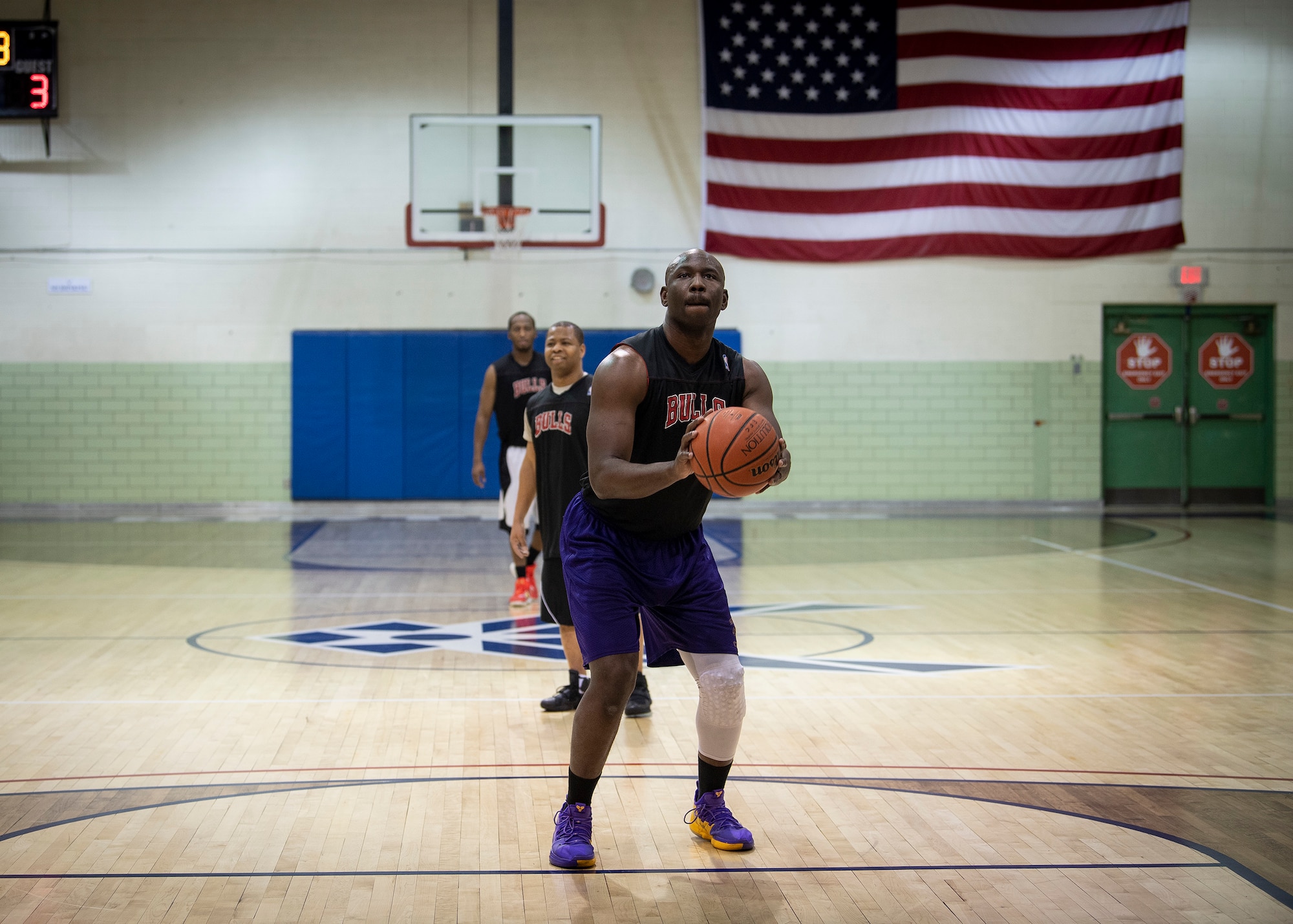 Airman 1st Class Rickie Jackson, a member of the FSS/CPTS intramural basketball team, prepares for a shot at Kirtland Air Force Base, N.M., Feb. 5, 2019. Jackson, assisted his team in a close win after defeating the SFS-Jones team 59 to 58. (U.S. Air Force photo by Staff Sgt. Kimberly Nagle)