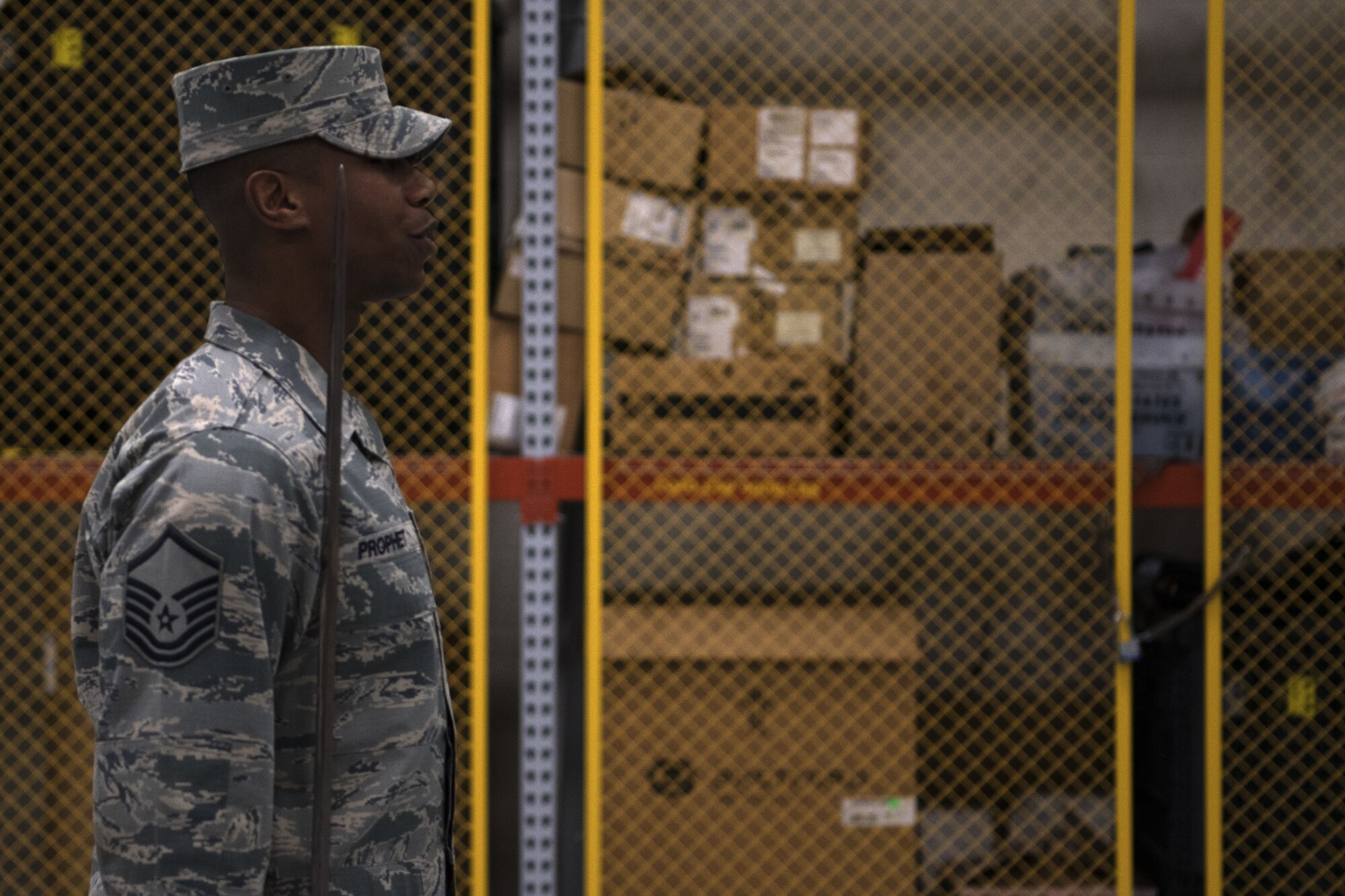 U.S. Air Force Master Sgt. Jason Prophet, Air Force Honor Guard Drill Team superintendent, gives a command during drill team practice inside the Roberts Consolidated Aircraft Maintenance Facility at Keesler Air Force Base, Mississippi, Jan. 30, 2019. The Air Force Honor Guard spends five weeks at Keesler perfecting their routine they are going to use for the rest of the year. (U.S. Air Force photo by Airman 1st Class Suzie Plotnikov)
