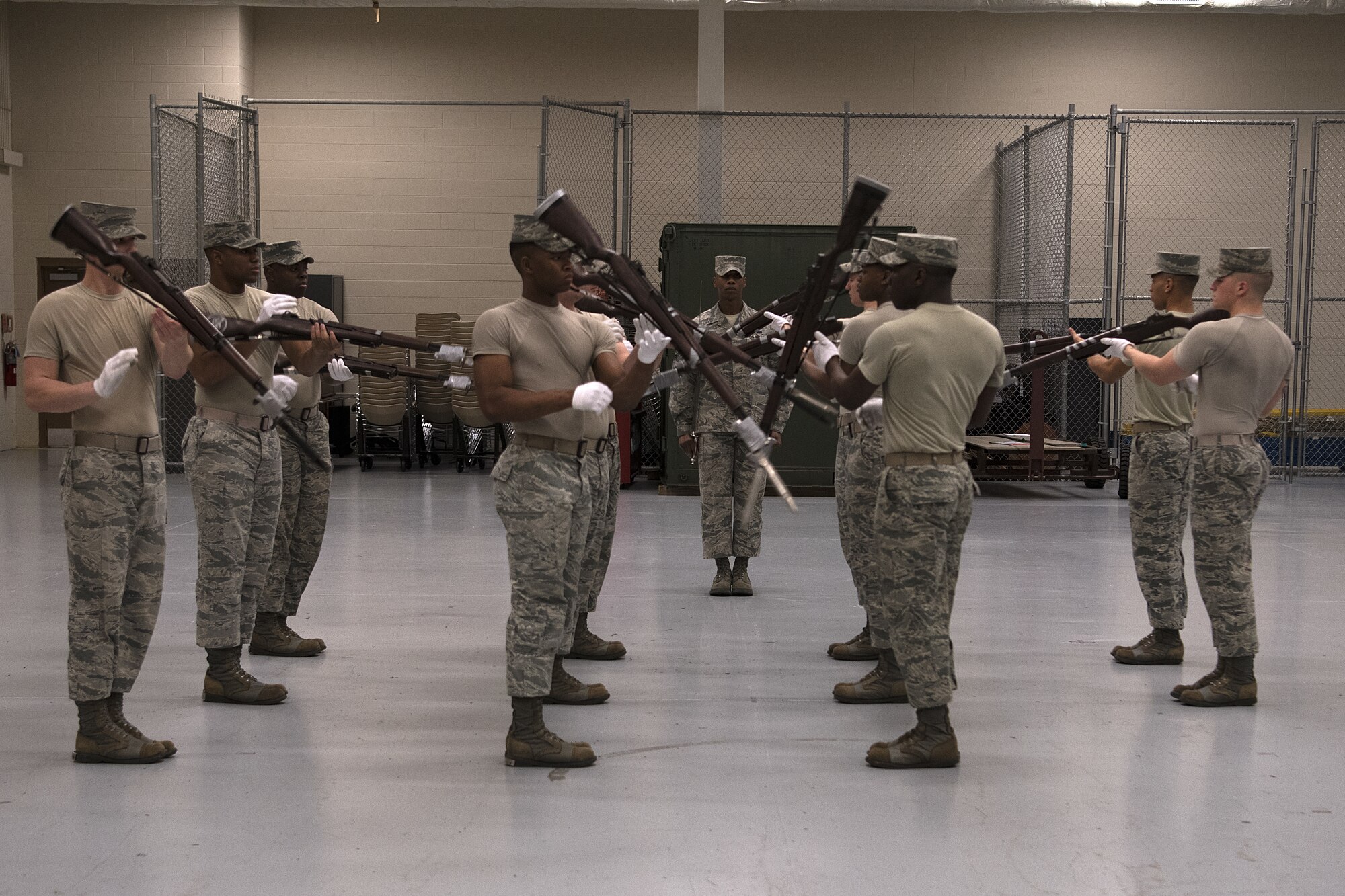 U.S. Air Force Honor Guard members practice their new routine inside the Roberts Consolidaated Aircraft Maintenance Facility at Keesler Air Force Base, Mississippi, Jan. 30, 2019. The Air Force Honor Guard spends five weeks at Keesler perfecting their routine they are going to use for the rest of the year. (U.S. Air Force photo by Airman 1st Class Suzie Plotnikov)