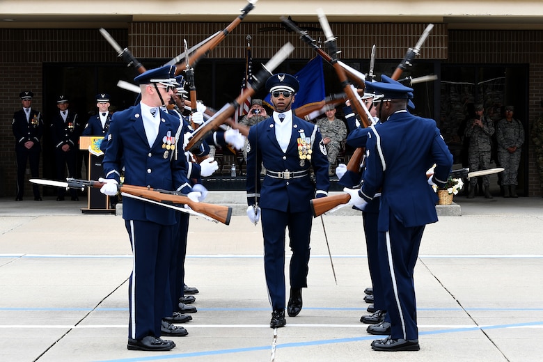 The U.S. Air Force Honor Guard Drill Team debuts their 2019 routine in front of Keesler leadership and 81st Training Group Airmen on the Levitow Training Support Facility drill pad at Keesler Air Force Base, Mississippi, Feb. 8, 2019. The team comes to Keesler every year for five weeks to develop a new routine that they will use throughout the year. (U.S. Air Force photo by Airman 1st Class Suzie Plotnikov)