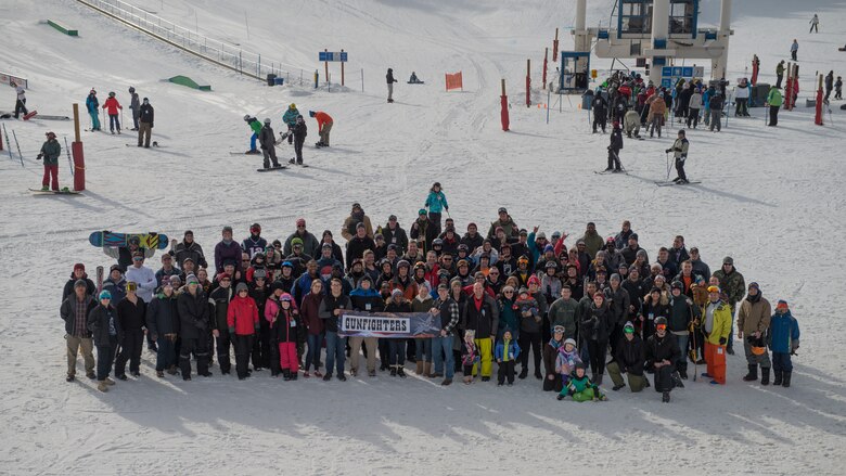 Members from the 366th Fighter Wing take a group photo, Feb. 1, 2019, at Boise National Forest, Idaho. The 366th FW celebrated Wing Ski Day to boost morale among mission focused Airmen. (U.S. Air Force photo by Airman 1st Class JaNae Capuno)