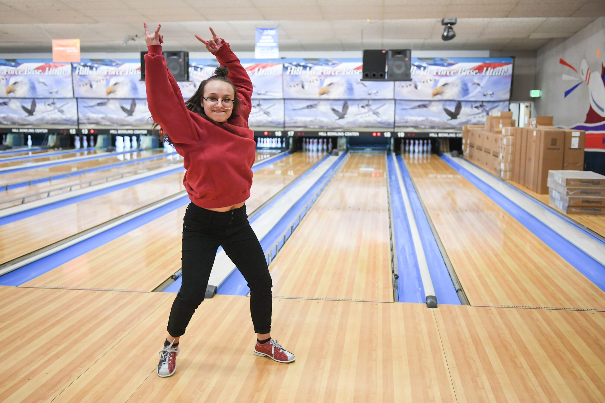 Makayla Prewitt bowls a spare Jan. 30, 2019, at the bowling event held by Exceptional Family Member Program-Family Support at Hill Air Force Base, Utah. (U.S. Air Force photo by Cynthia Griggs)