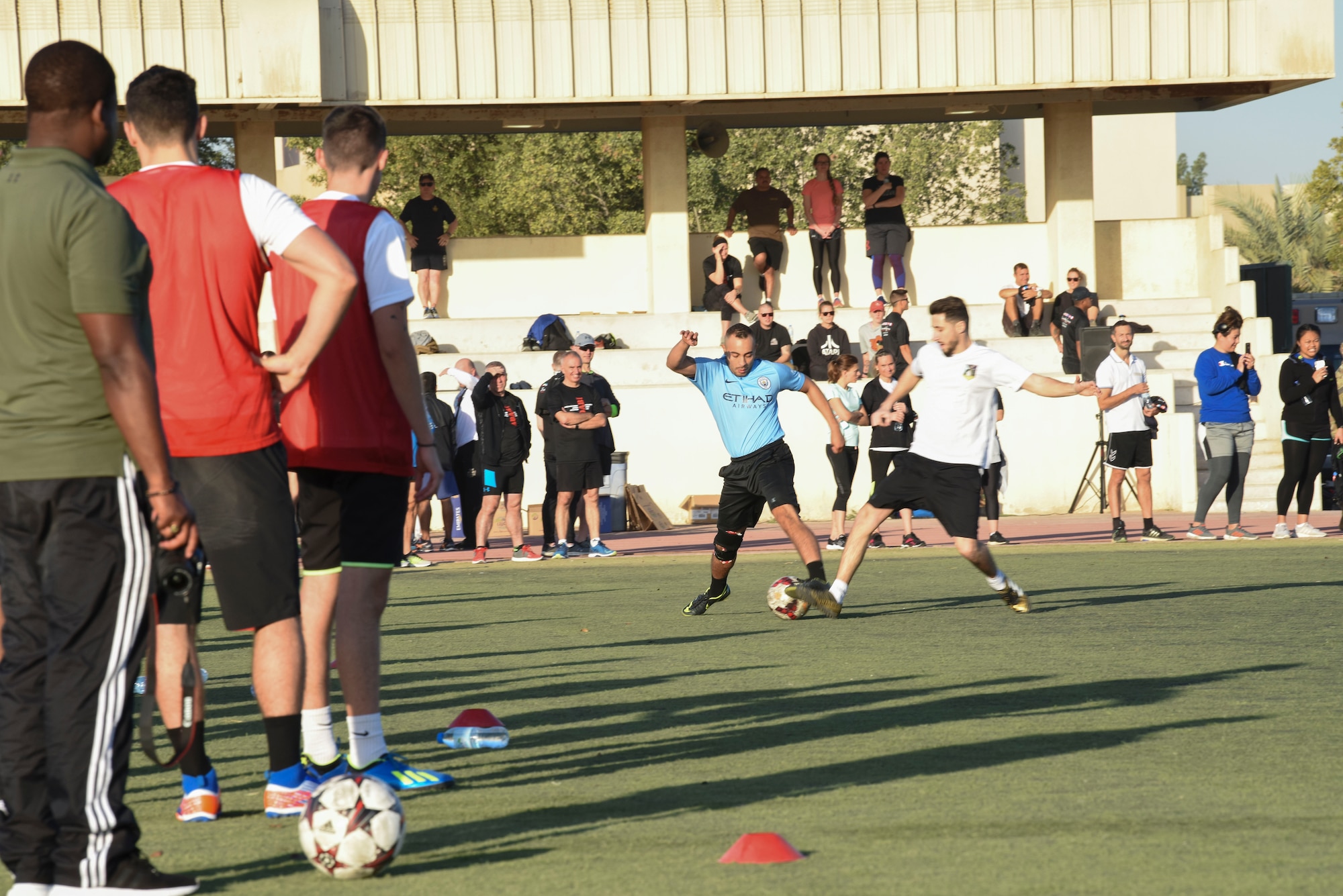 Members compete during the soccer portion of the Friendship Games Feb. 6, 2019, at Al Dhafra Air Base, United Arab Emirates.