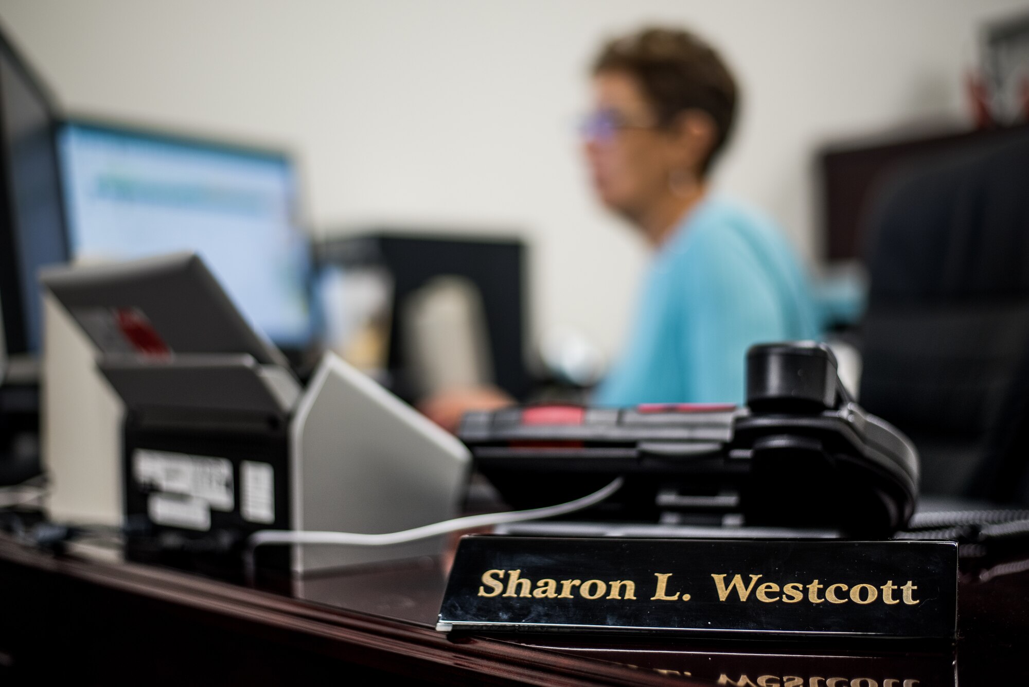 Sharon L. Westcott, 512th Maintenance Group commander’s secretary, works at her station at Dover Air Force Base, Delaware, Feb. 1, 2019. Westcott has worked in the Department of Defense for 37 years, assisting and helping develop more than 30 senior leaders. (U.S. Air Force photo by Staff Sgt. Damien Taylor)