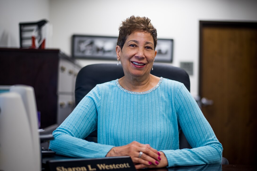 Sharon L. Westcott, 512th Maintenance Group commander’s secretary, poses for a photo at Dover Air Force Base, Delaware, Feb. 1, 2019. Westcott’s began her career in 1982 as a U.S. Army secretary at Joint Base McGuire-Dix-Lakehurst, New Jersey. (U.S. Air Force photo by Staff Sgt. Damien Taylor)