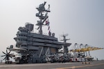 The aircraft carrier USS John C. Stennis (CVN 74) pulls in to Laem Chabang, Thailand, Feb. 10, 2019. The John C. Stennis is deployed to the U.S. 7th Fleet area of operations in support of security and stability in the Indo-Pacific region. (U.S. Navy photo by Mass Communication Specialist Seaman Jarrod A. Schad)