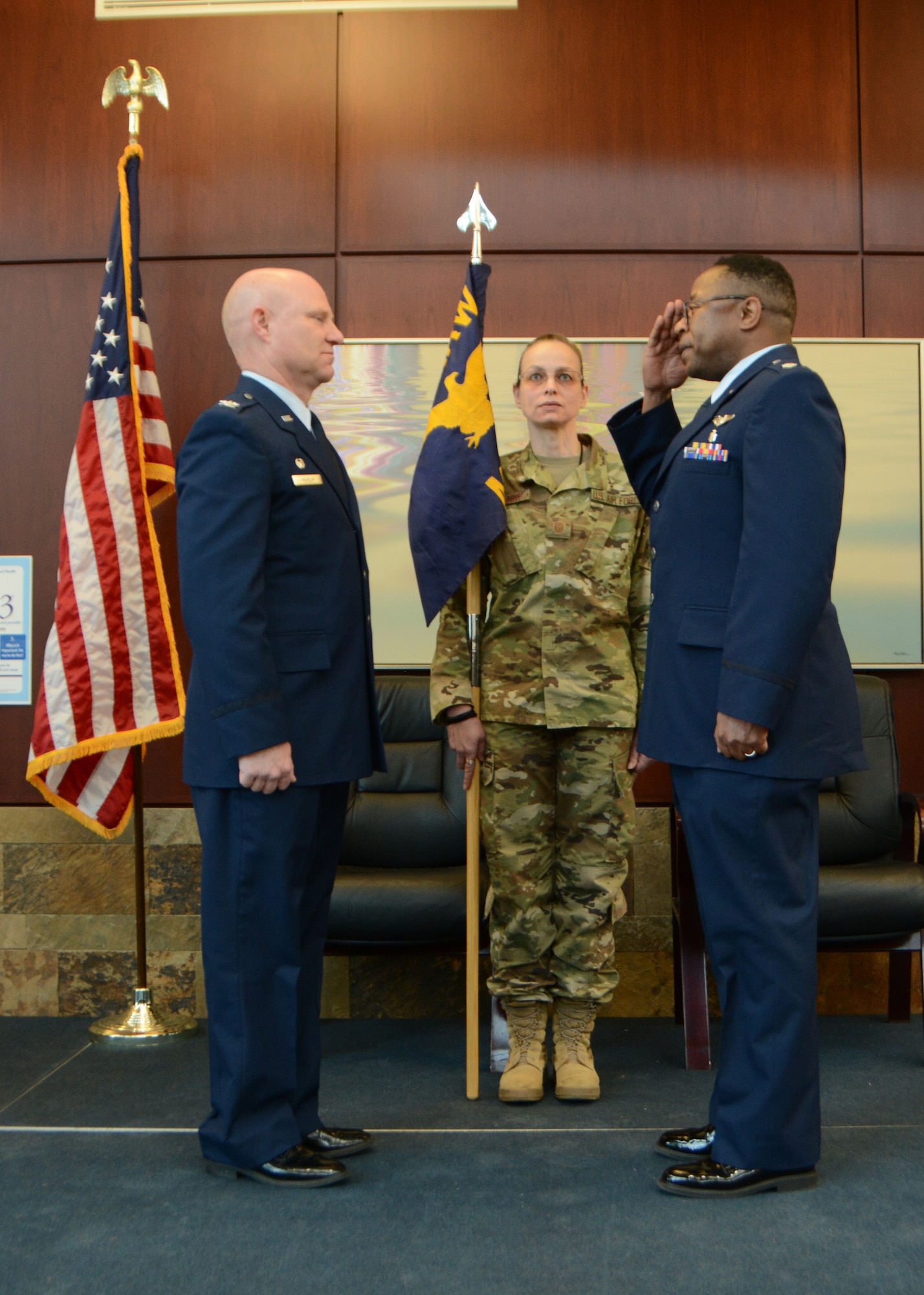 Lt. Col. (Dr.) Alvin Bradford salutes the 507th Air Refueling Wing Commander, Col. Miles Heaslip, as Bradford assumes command of the 507th Medical Squadron at Tinker Air Force Base, Oklahoma, Feb. 9, 2019. Prior to assuming command, Bradford had been the Chief of Aerospace Medicine in the 507th MDS. (U.S. Air Force photo by Master Sgt. Grady Epperly)