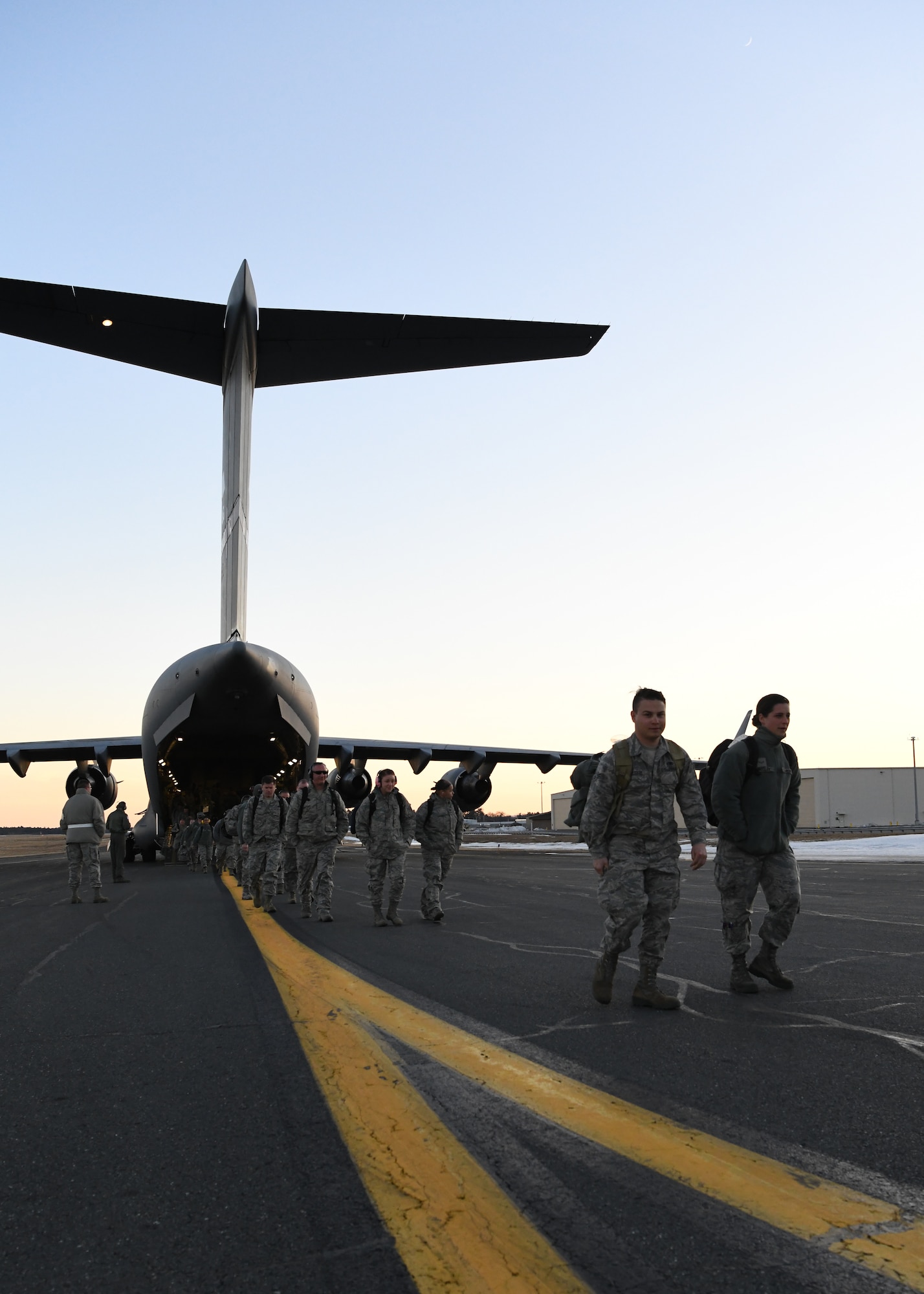 Airmen from the 104th Fighter Wing returned from a temporary duty assignment at Patrick Air Force Base in Florida on a C-17 Globemaster III from the 105th Airlift Wing in Stewart, New York Feb. 8, 2019, at Barnes Air National Guard Base, Massachusetts. Temporary duty assignments like this one provide training for Airmen that prepares them to be more efficient during larger deployments.  (U.S. Air National Guard photos by Airman Sara Kolinski)