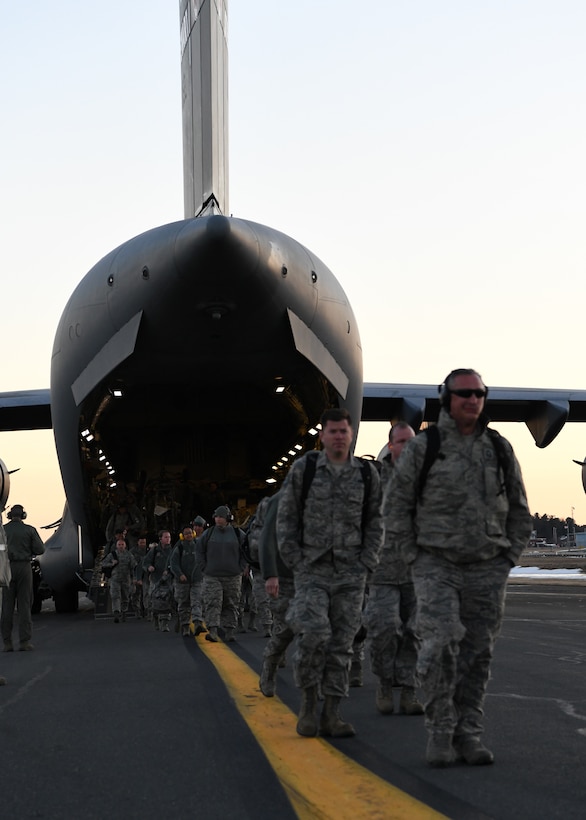 Airmen from the 104th Fighter Wing returned from a temporary duty assignment at Patrick Air Force Base in Florida on a C-17 Globemaster III from the 105th Airlift Wing in Stewart, New York Feb. 8, 2019, at Barnes Air National Guard Base, Massachusetts. The training that the Airmen recieved during this TDY is essential to the success of the mission.  (U.S. Air National Guard photos by Airman Sara Kolinski)