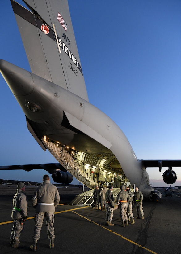 Airmen from the 104th Logistics Readiness Squadron helped unload pallets and equipment from a C-17 Globemaster III from the 105th Airlift Wing in Stewart, New York  Feb. 8, 2019, at Barnes Air National Guard Base, Massachusetts. The C-17 brought Airmen and equipment from Patrick Air Force Base in Florida back to the 104th Fighter Wing after a two week temporary duty assignment.  (U.S. Air National Guard photos by Airman Sara Kolinski)