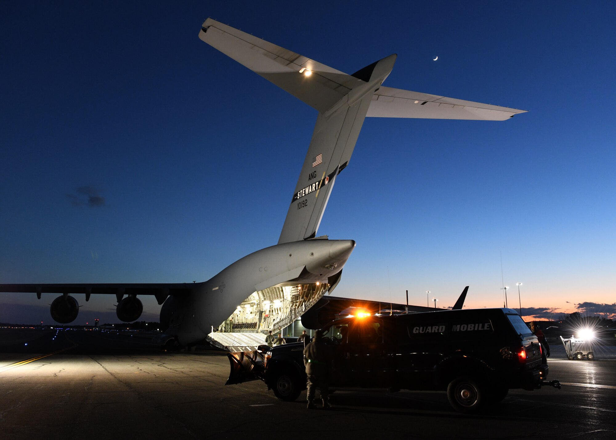 A C-17 Globemaster III from the 105th Airlift Wing in Stewart, New York supports the 104th Fighter Wing Feb. 8, 2019, at Barnes Air National Guard Base, Massachusetts. Airmen form the 104 FW coordinated with the 105 AW crew to safely get Airmen that had been at Patrick Air Force Base, Florida on a temporary duty assignment, back to the 104th.  (U.S. Air National Guard photos by Airman Sara Kolinski)
