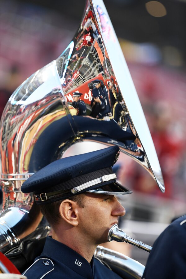 A musician with the U.S. Air Force Band of the Golden West from Travis Air Force Base, California, prepares for his halftime performance of the San Francisco Forty-Niners and New York Giants Monday Night Football game at Levi’s Stadium in Santa Clara, California, Nov. 12, 2018. The band performed in honor of Veterans Day and to support the National Football League’s Salute to Service Campaign. (U.S. Air Force photo by Louis Briscese)