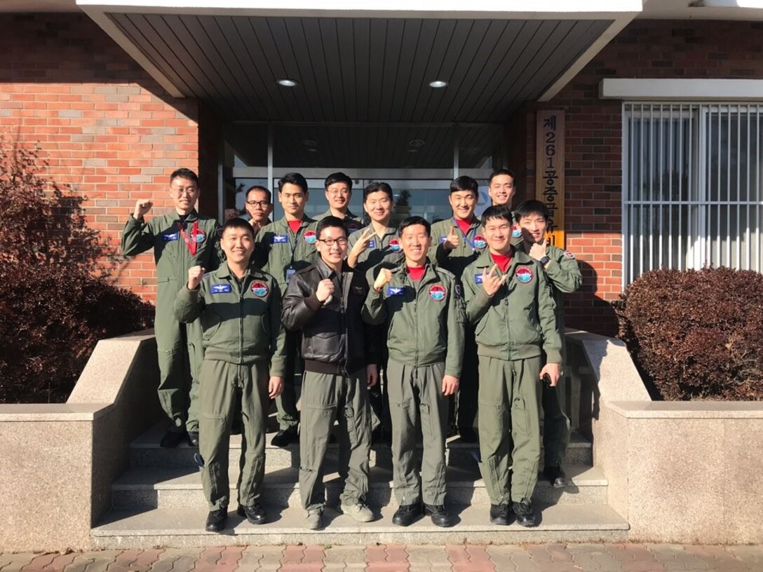 U.S. Air Force Capt. Jason Lim, front row, second from left, assigned to the 6th Air Refueling Squadron out of Travis Air Force Base, California, poses for a photo with Republic of Korea airmen assigned to the 261st Air Refueling Squadron at Gimhae Air Base, ROK, November 2018. (Courtesy photo by Captain Jason Lim)