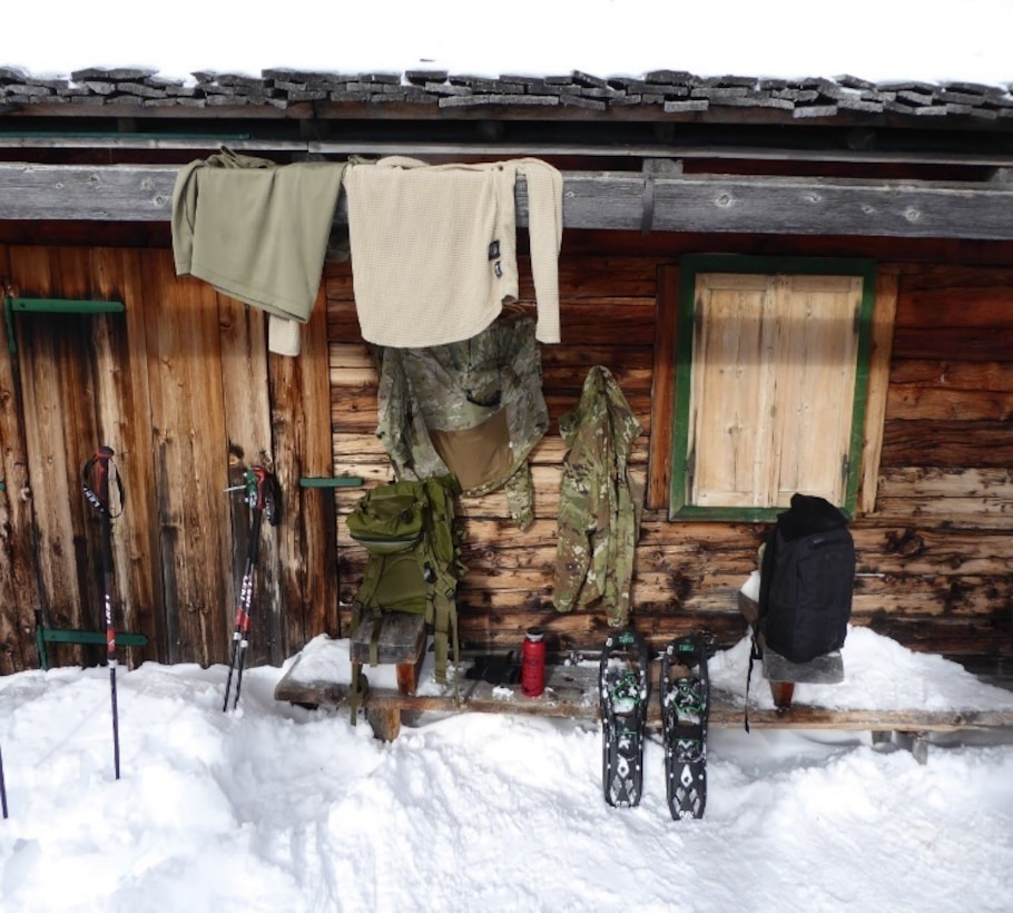 The 2500th Digital Liason Detachment dries out its gear after climbing to Refugio peak near Wiessenbach, Italy, Jan. 12 during the DLD's Jan 11-13 battle assembly.