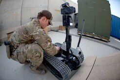 Staff Sgt. Joshua Holbrook, an explosive ordnance disposal technician assigned to the 753rd Ordnance Company displays the capability to use robots for reconnaissance Feb. 3, 2019.