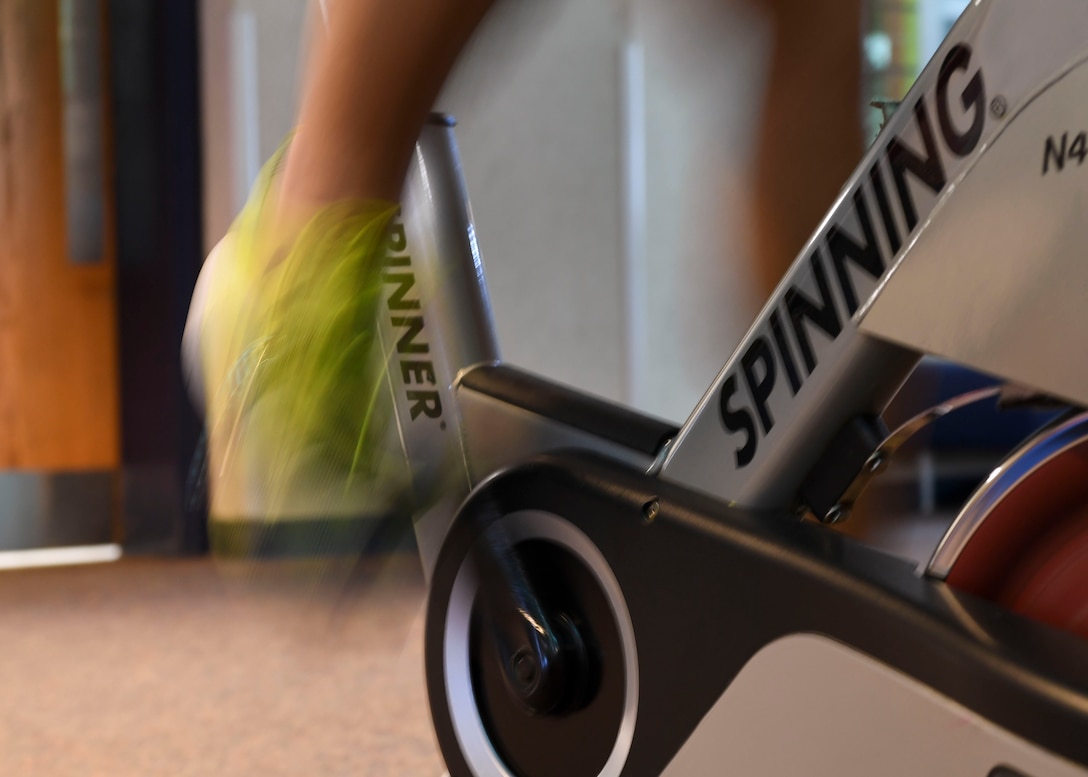 U.S. Air Force Staff Sgt. Anthony, 10th Intelligence Squadron, rides an stationary bike at Joint Base Langley-Eustis, Virginia, Feb. 7, 2019.