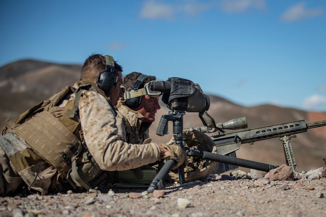 U.S. Marines Cpl. Ricardo Perez and Lance Cpl. Bryce Hopkins, both scout snipers with 3rd Battalion, 3rd Marine Regiment, Marine Air-Ground Task Force-6 (MAGTF-6) provide long distance fire support while conducting the Air Assault Course (AAC) during Integrated Training Exercise (ITX) 2-19 aboard Marine Corps Air-Ground Combat Center Twentynine Palms, Calif., Feb. 9, 2019. ITX creates a challenging, realistic training environment that produces combat-ready forces capable of operating as an integrated MAGTF. (U.S. Marine Corps photo by Sgt. Victor A. Mancilla)