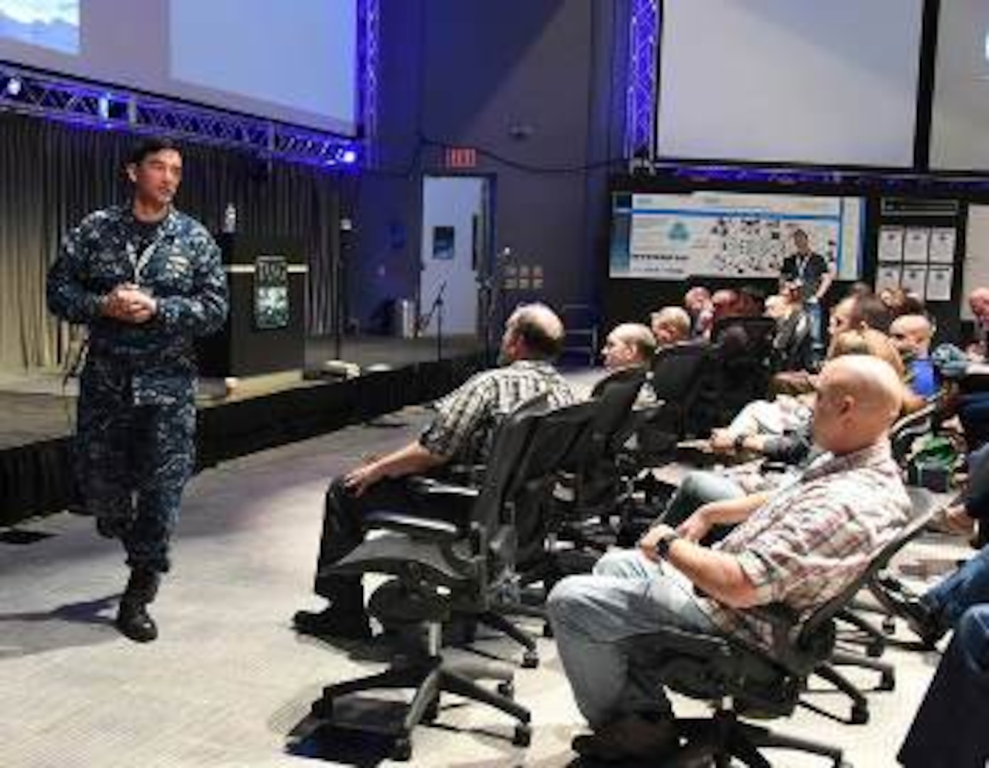 Rear Admiral Patrick Piercey, Commander Naval Surface Force Atlantic, discusses his thoughts on toughness and resiliency to the gathered innovators at a Tactical Advancement for the Next Generation (TANG) event focusing on Sailor toughness.