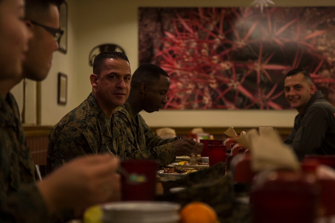 U.S. Marines assigned to Headquarters and Headquarters Squadron (H&HS) meet at the Marine Corps Air Station Yuma Mess Hall to have breakfast with Lt. Col. James C. Paxton, the commanding officer of H&HS, December 21, 2018. The purpose of the breakfast was to discuss holiday plans and  provide some of the Marines with the opportunity to sit down and talk with their commanding officer. (U.S. Marine Corps photo by Cpl. Isaac D. Martinez)