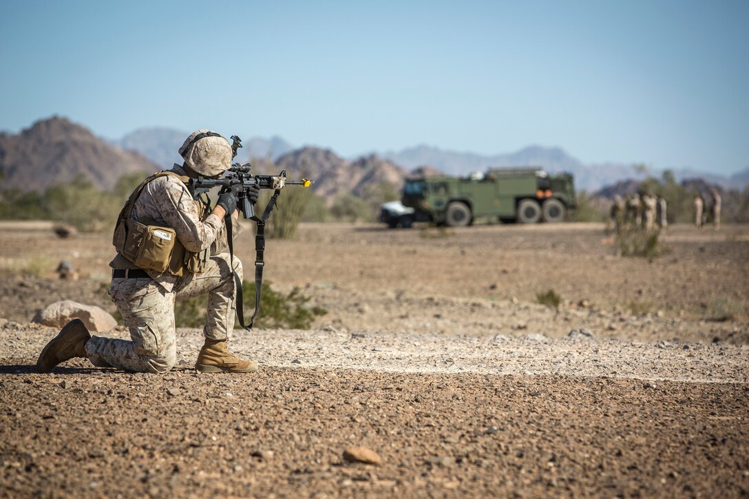 A U.S. Marine assigned to Marine Wing Support Squadron 371 (MWSS-371) provides security as a MV-22B Osprey leaves Forward Armored Refueling Point (FARP) - LZ Star, Jan. 22, 2019. During this portion of the training exercise, the bulk fuels specialists of MWSS-371 practiced setting up security for an MV-22B Osprey landing at AUX II. The MV-22B is a tiltrotor aircraft with both vertical takoff and landing (VTOL), and short takeoff and landing capabilities (STOL) and is the primary assault support aircraft for the U.S. Marine Corps. MCAS Yuma is a prime location to conduct military training with its variety of different training range; both foreign military units and all branches of the U.S. military that visit the air station utilize the ranges throughout the year. (U.S. Marine Corps photo by Cpl. Isaac D. Martinez)