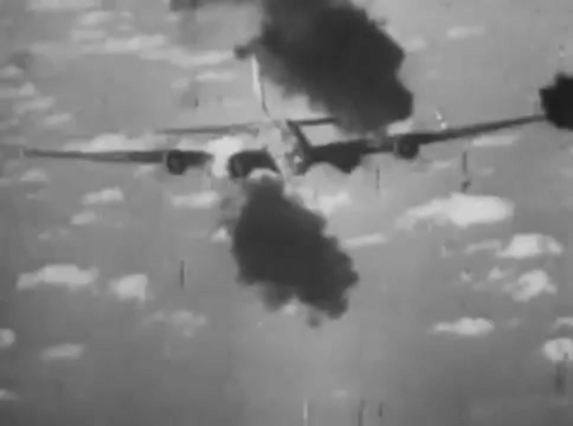 Photo taken by a German fighter during a head-on attack on an American B-17 Flying Fortress, possibly in 1943. The black smoke comes from hits made by the German fighter on the B-17. (Archive photo)