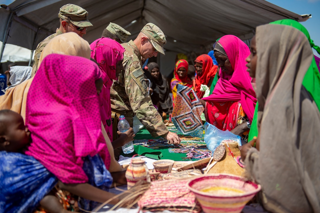 U.S. troops celebrate with Djiboutians.