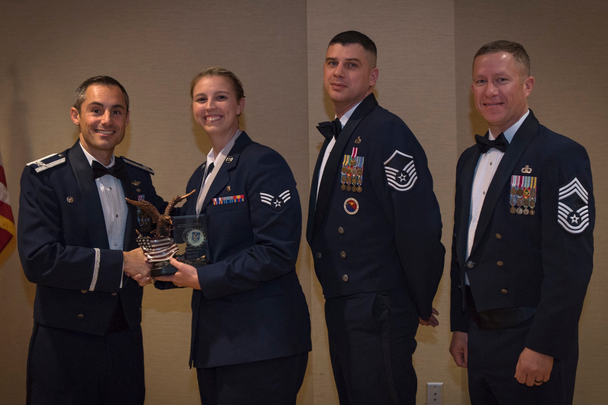 Airmen recieve awards from Airman Leadership School (ALS), Feb. 7, 2019, at Moody Air Force Base, Ga. ALS is a the 5-week course designed to develop Airmen into effective front-line supervisors by focusing on building leadership abilities, teamwork skills and effective communication. (U.S. Air Force photo by Airman Taryn Butler)