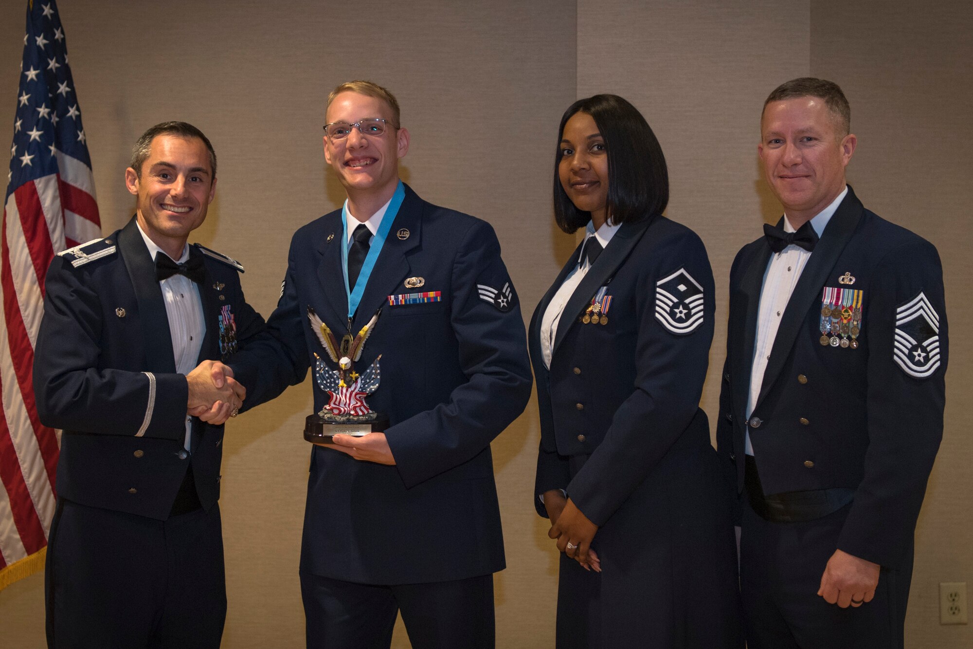 Airmen recieve awards from Airman Leadership School (ALS), Feb. 7, 2019, at Moody Air Force Base, Ga. ALS is a the 5-week course designed to develop Airmen into effective front-line supervisors by focusing on building leadership abilities, teamwork skills and effective communication. (U.S. Air Force photo by Airman Taryn Butler)