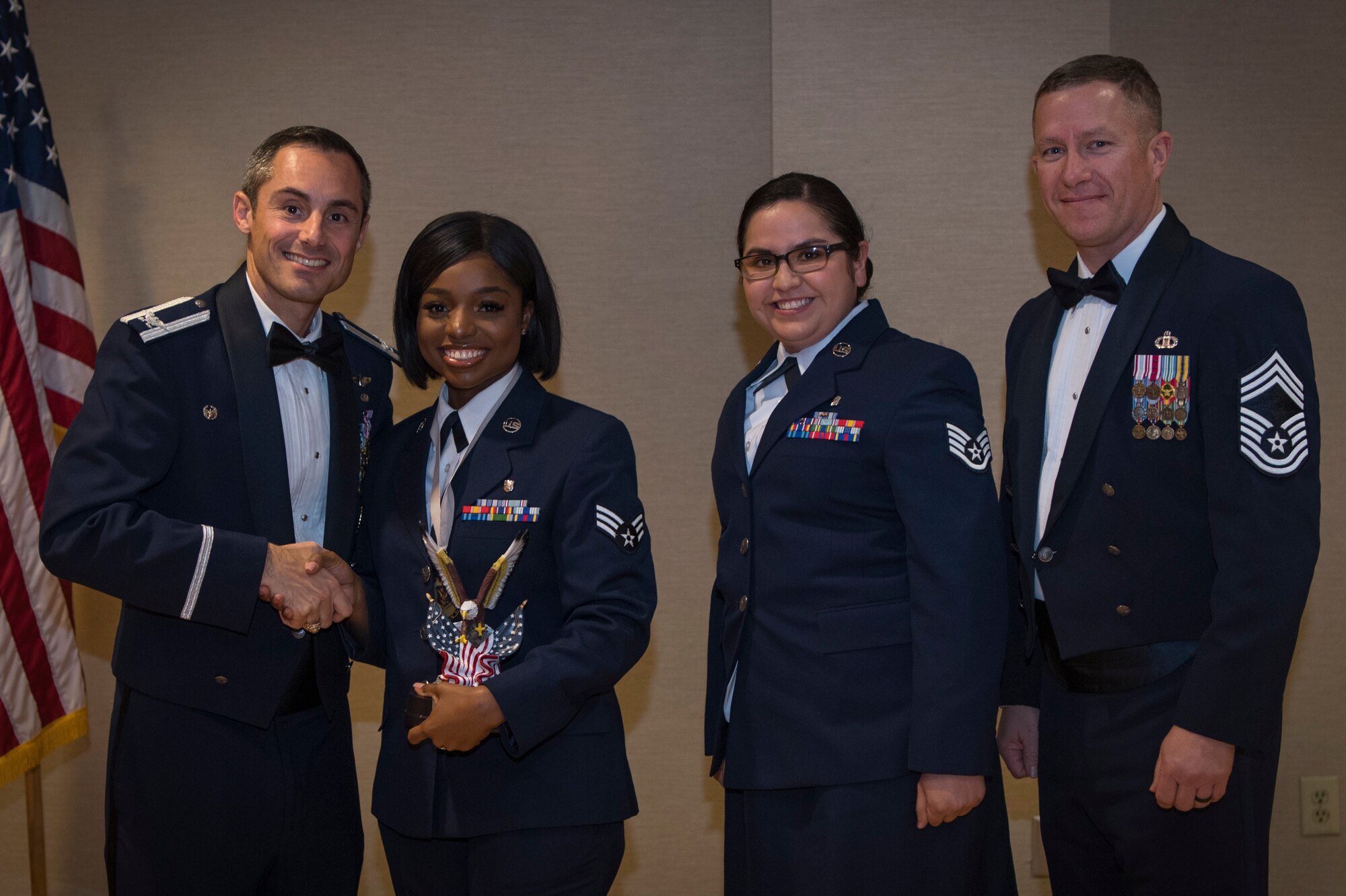 Airmen recieve awards from Airman Leadership School (ALS), Feb. 7, 2019, at Moody Air Force Base, Ga. ALS is a the 5-week course designed to develop Airmen into effective front-line supervisors by focusing on building leadership abilities, teamwork skills and effective communication. (U.S. Air Force photo by Airman Taryn Butler)